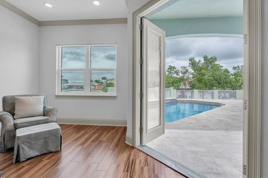 Welcome to 811 Birdie Way, a stunning custom-built waterfront - photo 12