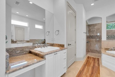 Welcome to 811 Birdie Way, a stunning custom-built waterfront - photo 16
