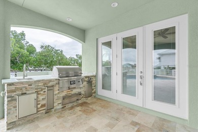 Welcome to 811 Birdie Way, a stunning custom-built waterfront - photo 22