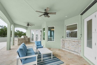 Welcome to 811 Birdie Way, a stunning custom-built waterfront - photo 23