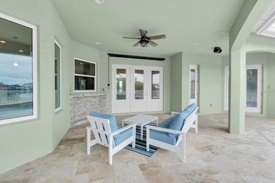 Welcome to 811 Birdie Way, a stunning custom-built waterfront - photo 24