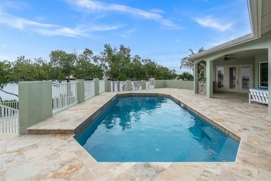Welcome to 811 Birdie Way, a stunning custom-built waterfront - photo 25