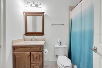 Welcome to 811 Birdie Way, a stunning custom-built waterfront - photo 46