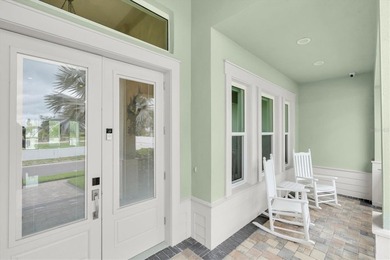 Welcome to 811 Birdie Way, a stunning custom-built waterfront - photo 49