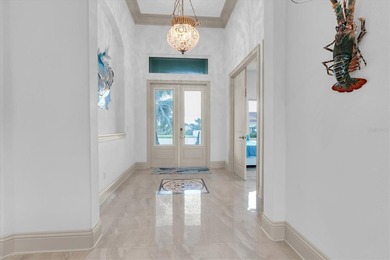 Welcome to 811 Birdie Way, a stunning custom-built waterfront - photo 50