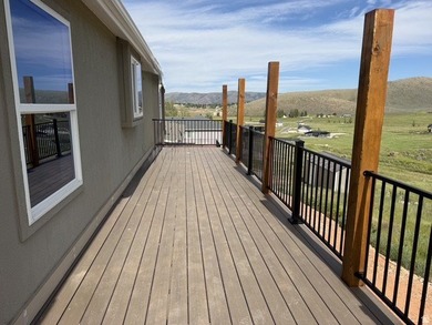 This remodeled manufactured home was relocated to its current - photo 3