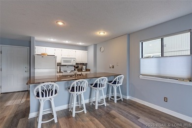 Imagine waking up to miles of sparkling lake views stretching - photo 12