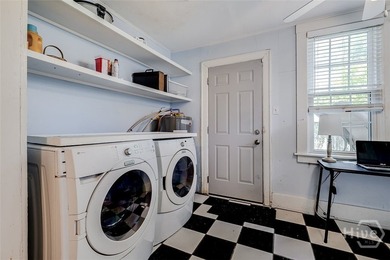 Built in 1923, this charming brick bungalow delivers the - photo 14