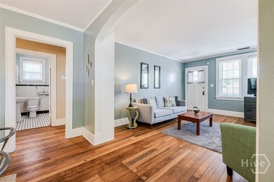 Built in 1923, this charming brick bungalow delivers the - photo 17