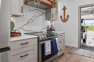 Lake Living at Its Best! Enjoy waterfront living in this - photo 23