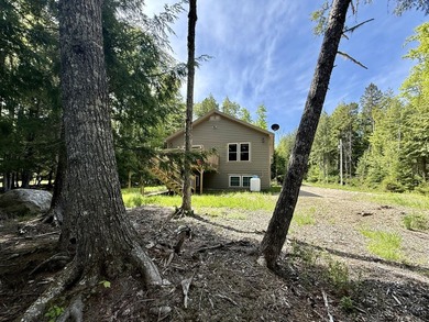 Set on 2 private acres along the shores of beautiful Long Lake - photo 8
