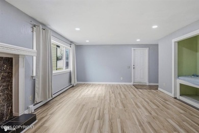 This charming home features a spacious layout with a large - photo 4
