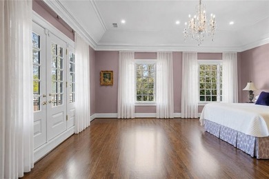 Located on Lullwater Road, the premier tree-lined street in - photo 18
