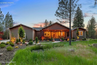 Set on a private, level 4.62-acre treed estate in desirable - photo 3