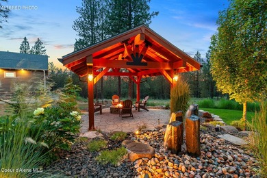 Set on a private, level 4.62-acre treed estate in desirable - photo 6
