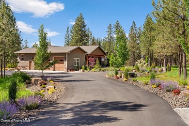 Set on a private, level 4.62-acre treed estate in desirable - photo 10
