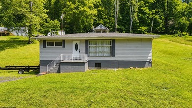 This charming 3-bedroom, 1-bath home is ideally located just - photo 2