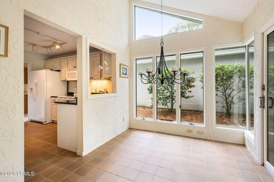 Tucked beneath a canopy of moss-draped oaks in the prestigious - photo 11