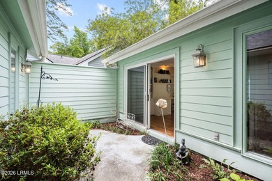 Tucked beneath a canopy of moss-draped oaks in the prestigious - photo 16