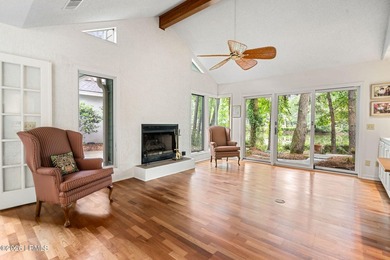 Tucked beneath a canopy of moss-draped oaks in the prestigious - photo 18
