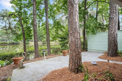 Tucked beneath a canopy of moss-draped oaks in the prestigious - photo 22