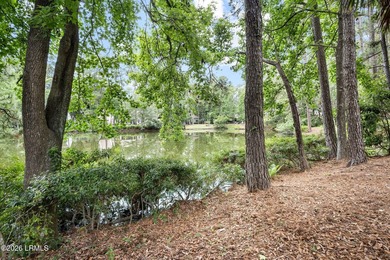 Tucked beneath a canopy of moss-draped oaks in the prestigious - photo 25