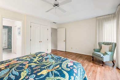 Tucked beneath a canopy of moss-draped oaks in the prestigious - photo 29