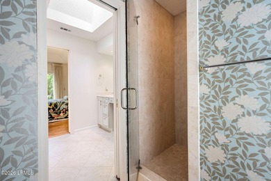 Tucked beneath a canopy of moss-draped oaks in the prestigious - photo 31