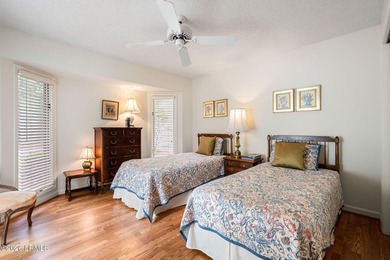 Tucked beneath a canopy of moss-draped oaks in the prestigious - photo 32