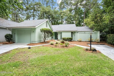 Tucked beneath a canopy of moss-draped oaks in the prestigious - photo 45