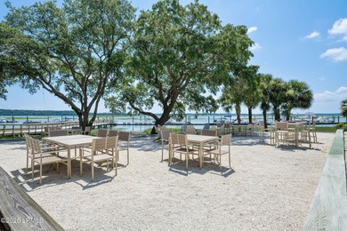 Tucked beneath a canopy of moss-draped oaks in the prestigious - photo 47