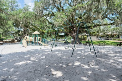 Tucked beneath a canopy of moss-draped oaks in the prestigious - photo 49