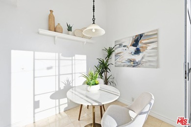 Welcome home to this rarely available top-floor condo offering