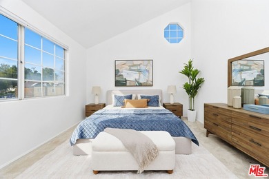 Welcome home to this rarely available top-floor condo offering