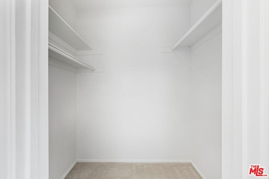 Welcome home to this rarely available top-floor condo offering