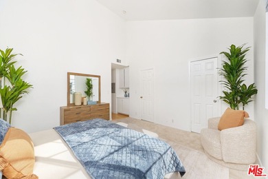 Welcome home to this rarely available top-floor condo offering