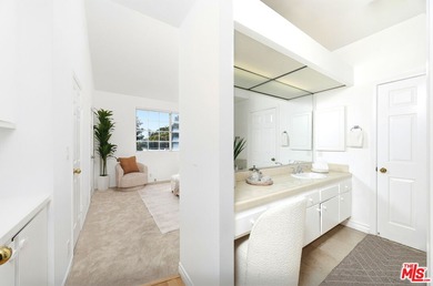 Welcome home to this rarely available top-floor condo offering