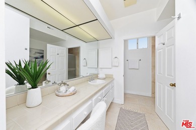 Welcome home to this rarely available top-floor condo offering