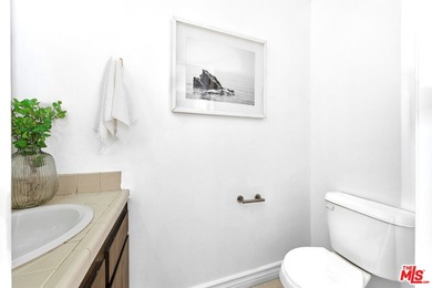 Welcome home to this rarely available top-floor condo offering