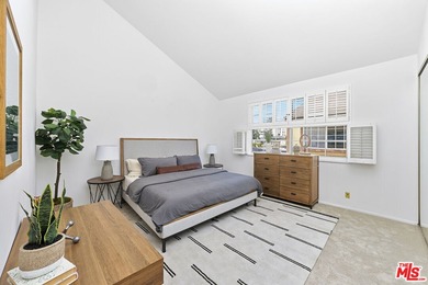 Welcome home to this rarely available top-floor condo offering