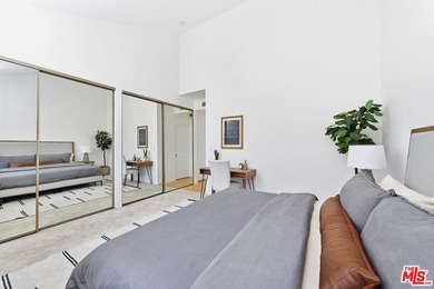 Welcome home to this rarely available top-floor condo offering