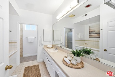 Welcome home to this rarely available top-floor condo offering