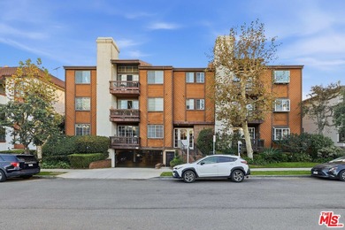 Welcome home to this rarely available top-floor condo offering