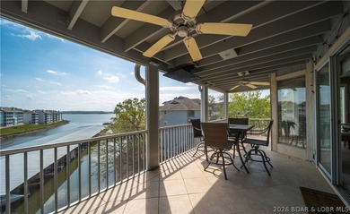 Enjoy stunning lake views from your screened-in deck overlooking - photo 14