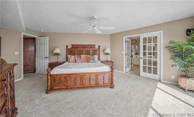 Enjoy stunning lake views from your screened-in deck overlooking - photo 17