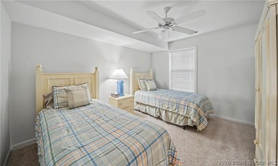Enjoy stunning lake views from your screened-in deck overlooking - photo 24