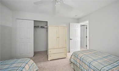 Enjoy stunning lake views from your screened-in deck overlooking - photo 25