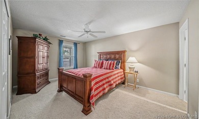 Enjoy stunning lake views from your screened-in deck overlooking - photo 26
