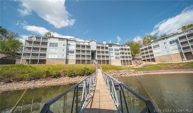 Enjoy stunning lake views from your screened-in deck overlooking - photo 38