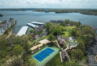 Enjoy stunning lake views from your screened-in deck overlooking - photo 42